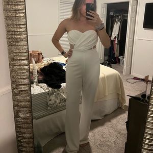 Lulu’s white jumpsuit.